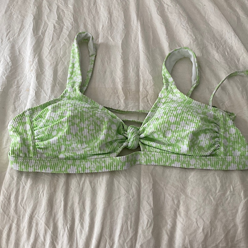 New - never worn Xhilaration swim top. Green/white - will fit D/DD